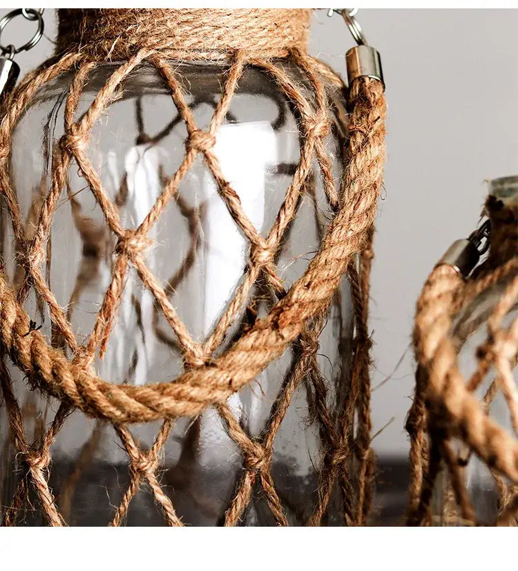 Rustic hanging glass vase with twine and metal handle – living room
