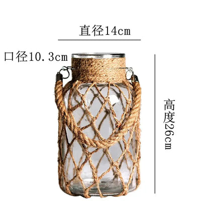 Rustic hanging glass vase with twine and metal handle – living room
