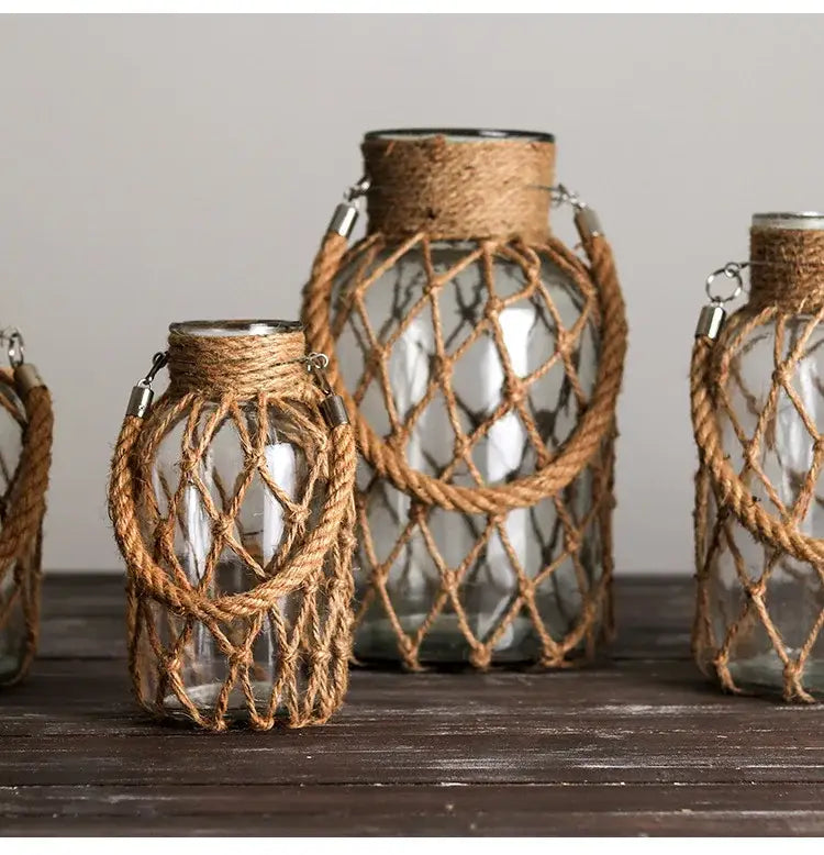 Rustic hanging glass vase with twine and metal handle – living room