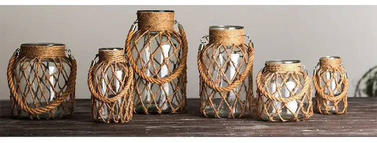 Rustic hanging glass vase with twine and metal handle – living room