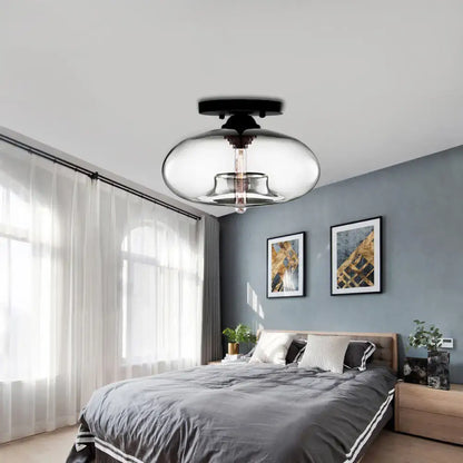 Modern black and glass oval flush mount – hallway ceiling light