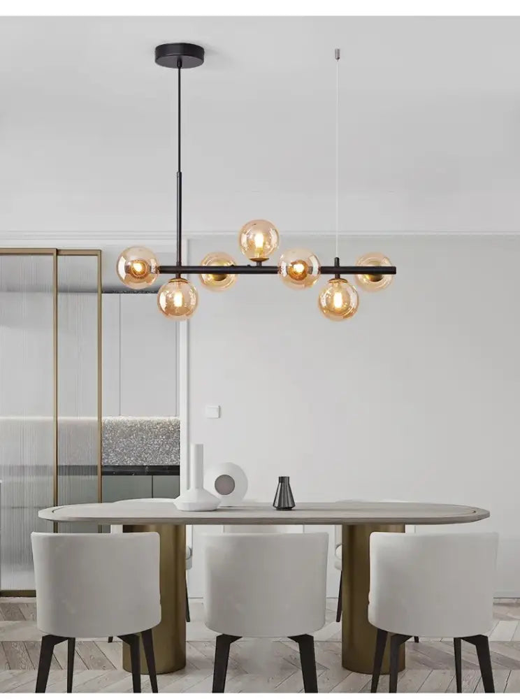 Sleek black metal glass ball chandelier for dining room
