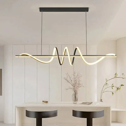 Sleek wavy pendant lights for dining room with brushed metallic finish