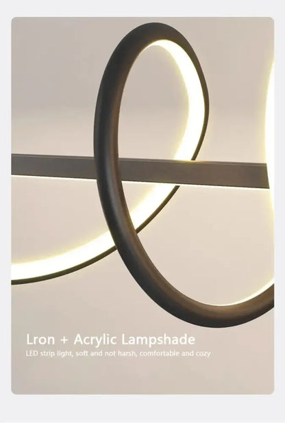 Sleek wavy pendant lights for dining room with brushed metallic finish