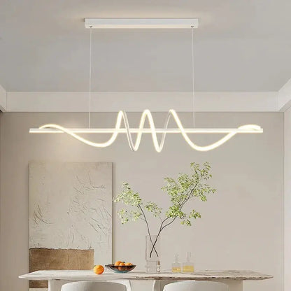 Sleek wavy pendant lights for dining room with brushed metallic finish