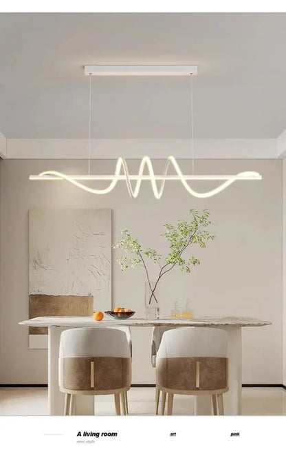 Sleek wavy pendant lights for dining room with brushed metallic finish