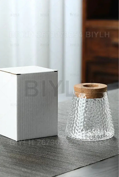 Small transparent glass vase with bamboo base for living room decor