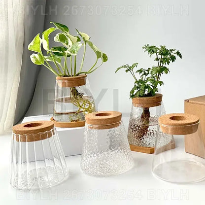 Small transparent glass vase with bamboo base for living room decor