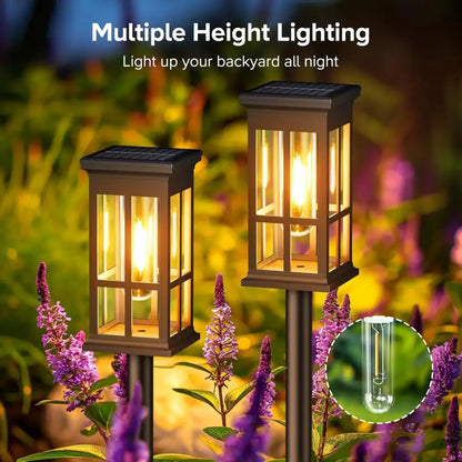 Bronze solar pathway lights warm yellow glass lanterns outdoor garden