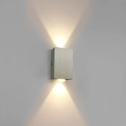 Modern brushed silver sphera wall sconces bedroom warm light beam