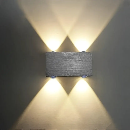 Modern brushed silver sphera wall sconces bedroom warm light beam
