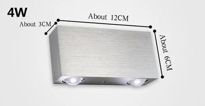 Modern brushed silver sphera wall sconces bedroom warm light beam