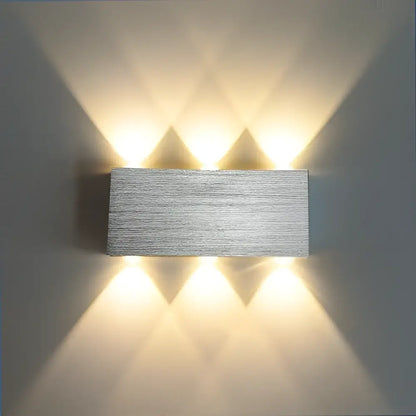 Modern brushed silver sphera wall sconces bedroom warm light beam