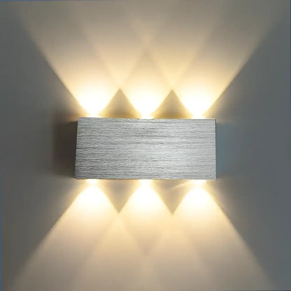 Modern brushed silver sphera wall sconces bedroom warm light beam