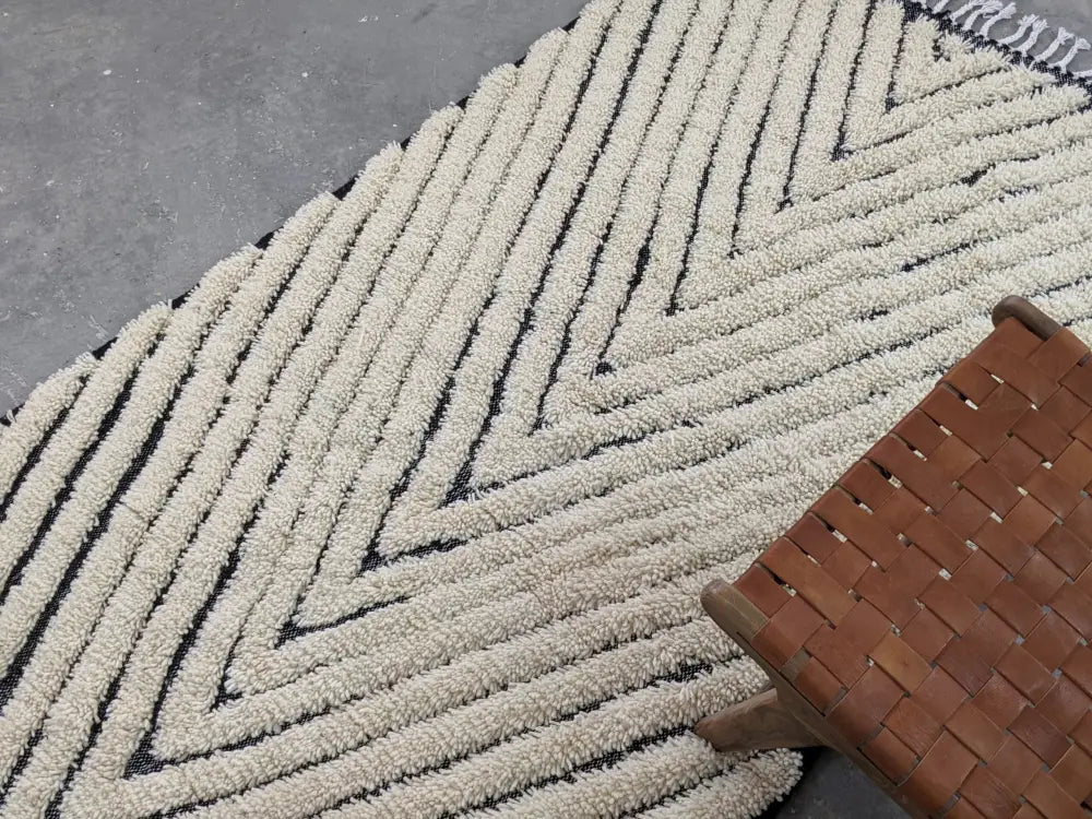 Traditional beni ouarain cream & black wool rug living room