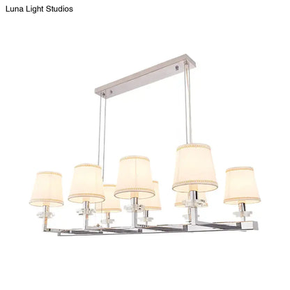 Modern chrome pendant light fixture with fabric shades dining room