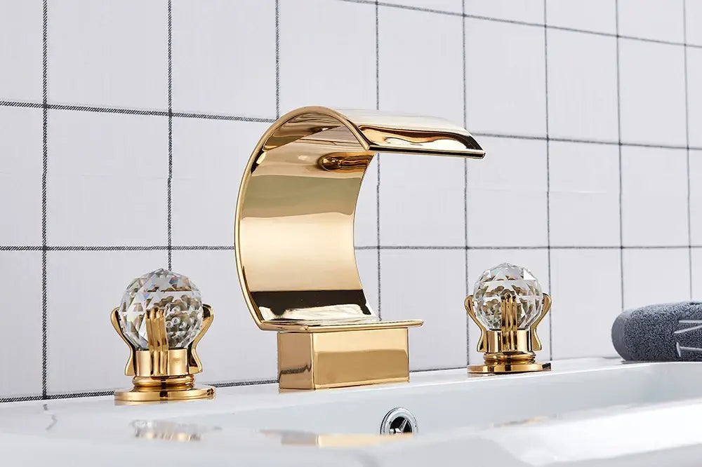 Luxury gold waterfall bathroom basin faucet with crystal knob