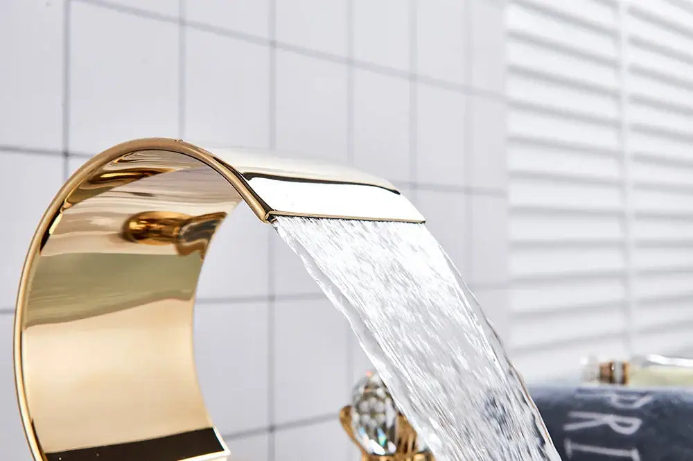 Luxury gold waterfall bathroom basin faucet with crystal knob