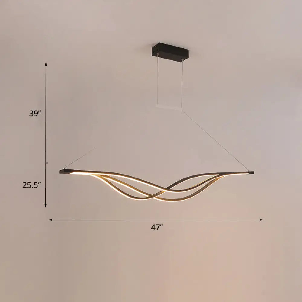 Modern black and gold wave shaped island light fixture dining room