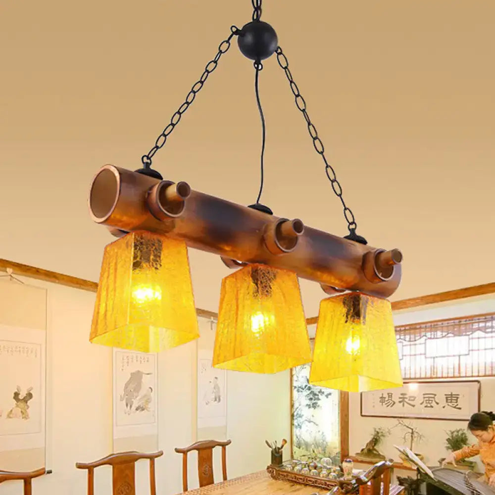 Rustic bamboo yellow water glass pendant light – dining room