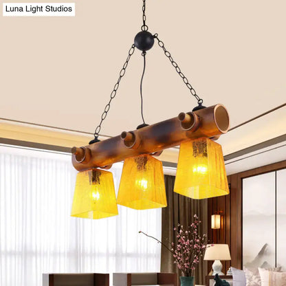 Rustic bamboo yellow water glass pendant light – dining room