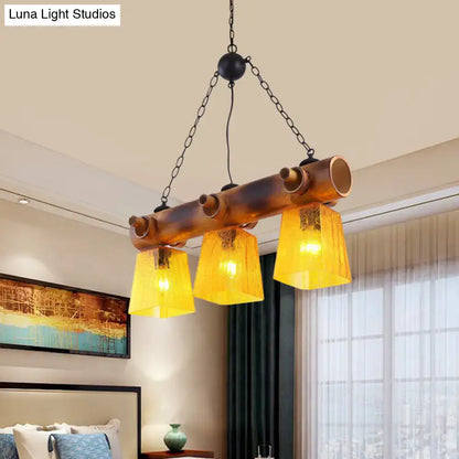 Rustic bamboo yellow water glass pendant light – dining room