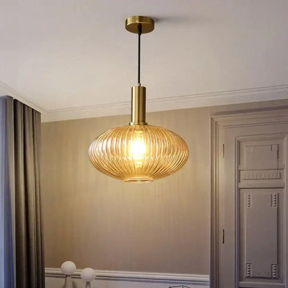 Elegant amber ribbed glass pendant lights for dining room