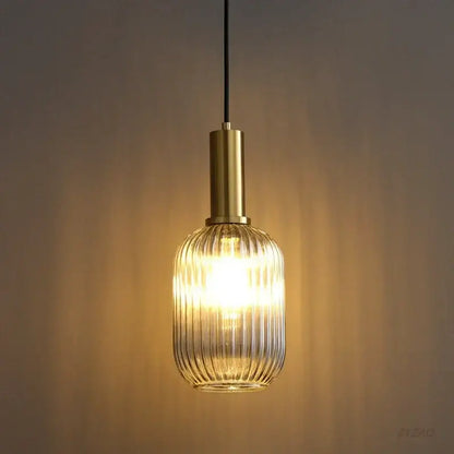Elegant amber ribbed glass pendant lights for dining room