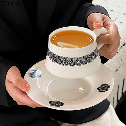 Elegant black and white floral porcelain cup and saucer set dining room