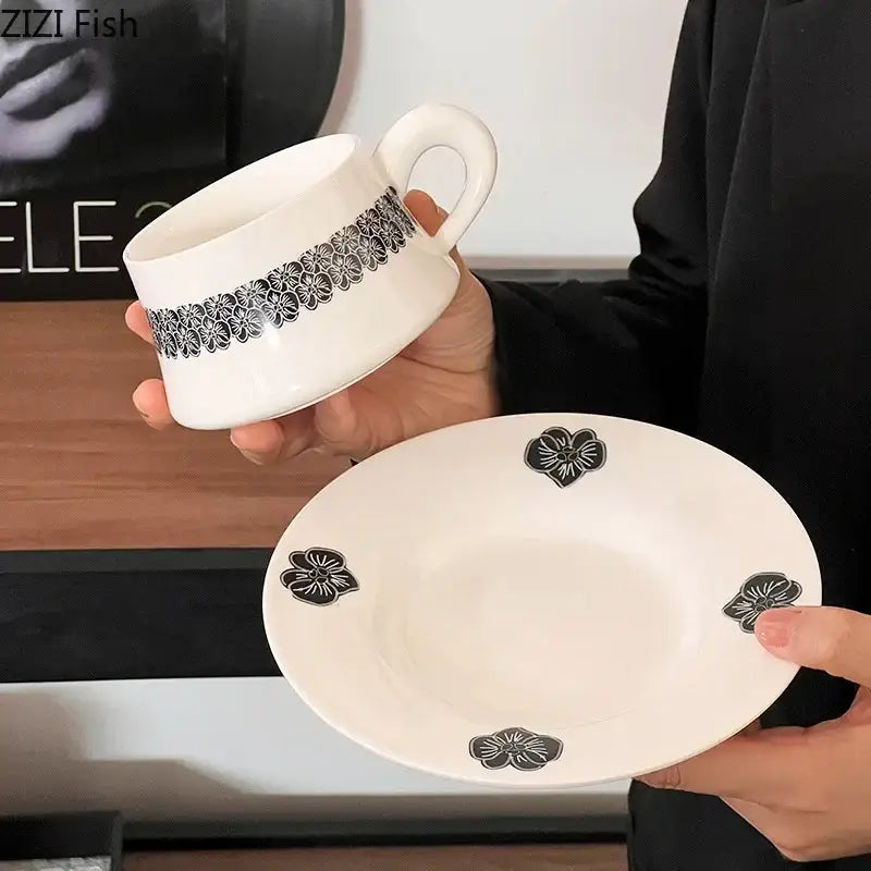 Elegant black and white floral porcelain cup and saucer set dining room