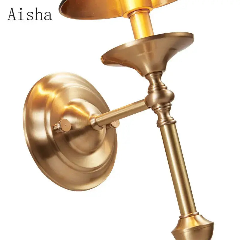 Elegant black & gold wall lamp for bedroom with textured shade