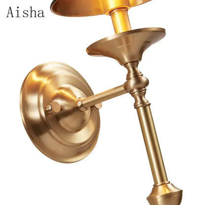 Elegant black & gold wall lamp for bedroom with textured shade