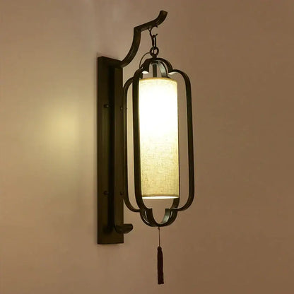 Elegant black wrought iron wall sconce lamp with tassel bedroom light