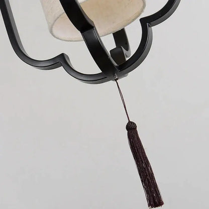 Elegant black wrought iron wall sconce lamp with tassel bedroom light