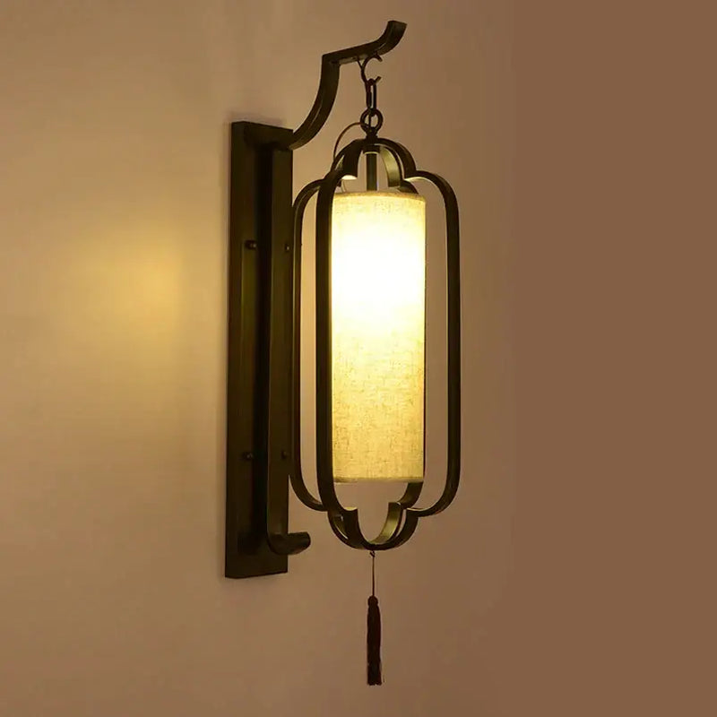 Elegant black wrought iron wall sconce lamp with tassel bedroom light