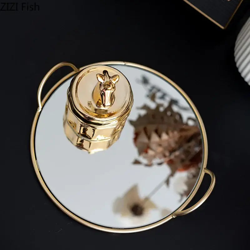 Elegant giraffe gold ceramic jar and brass handle storage tray dining room