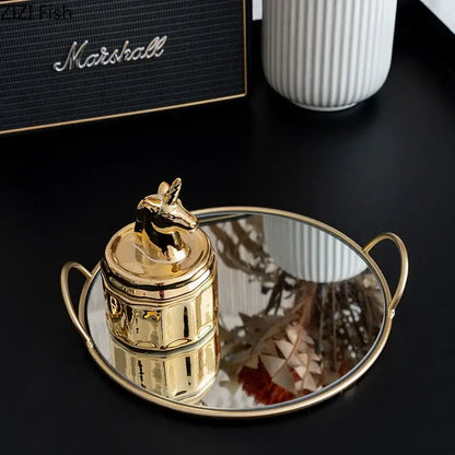 Elegant giraffe gold ceramic jar and brass handle storage tray dining room