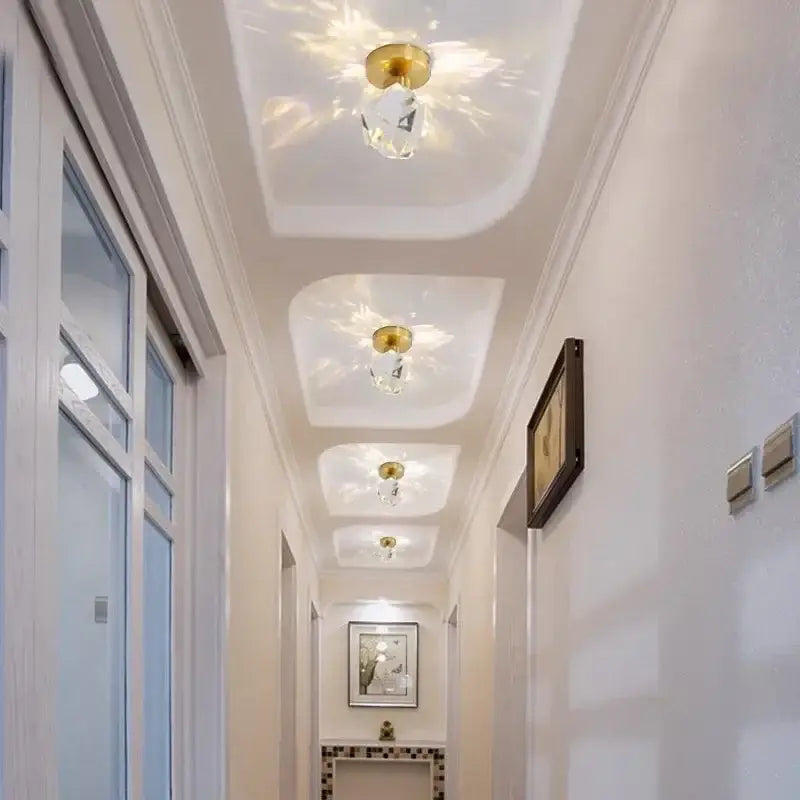 Elegant gold crystal ceiling light fixture for hallway entrance
