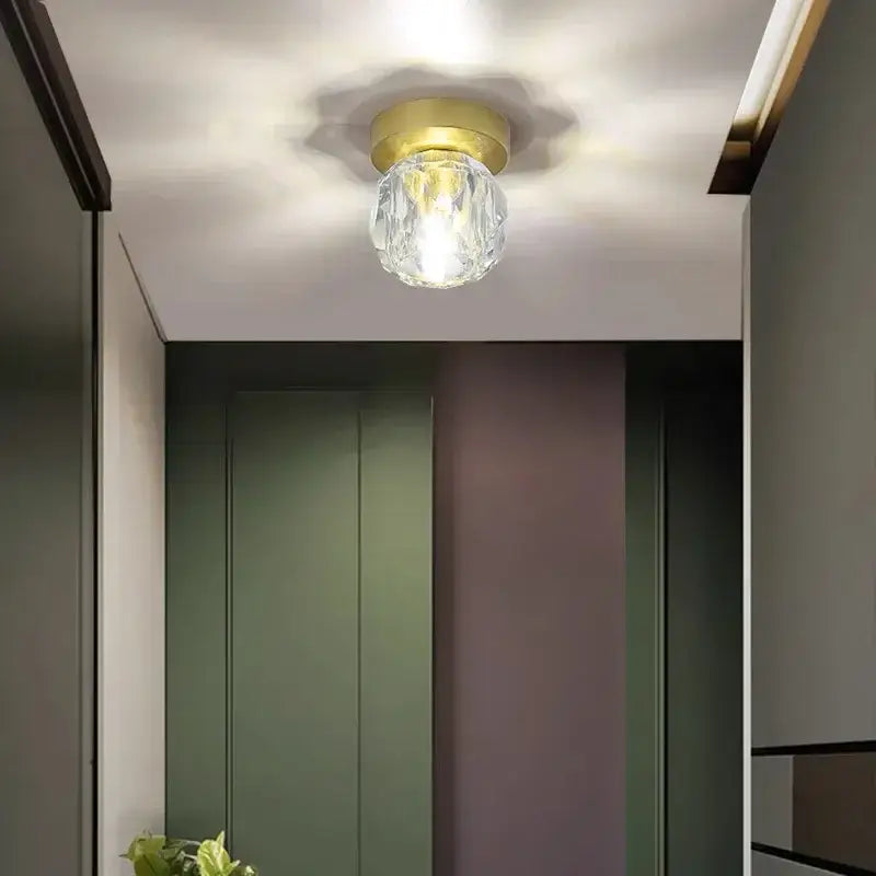 Elegant gold crystal ceiling light fixture for hallway entrance