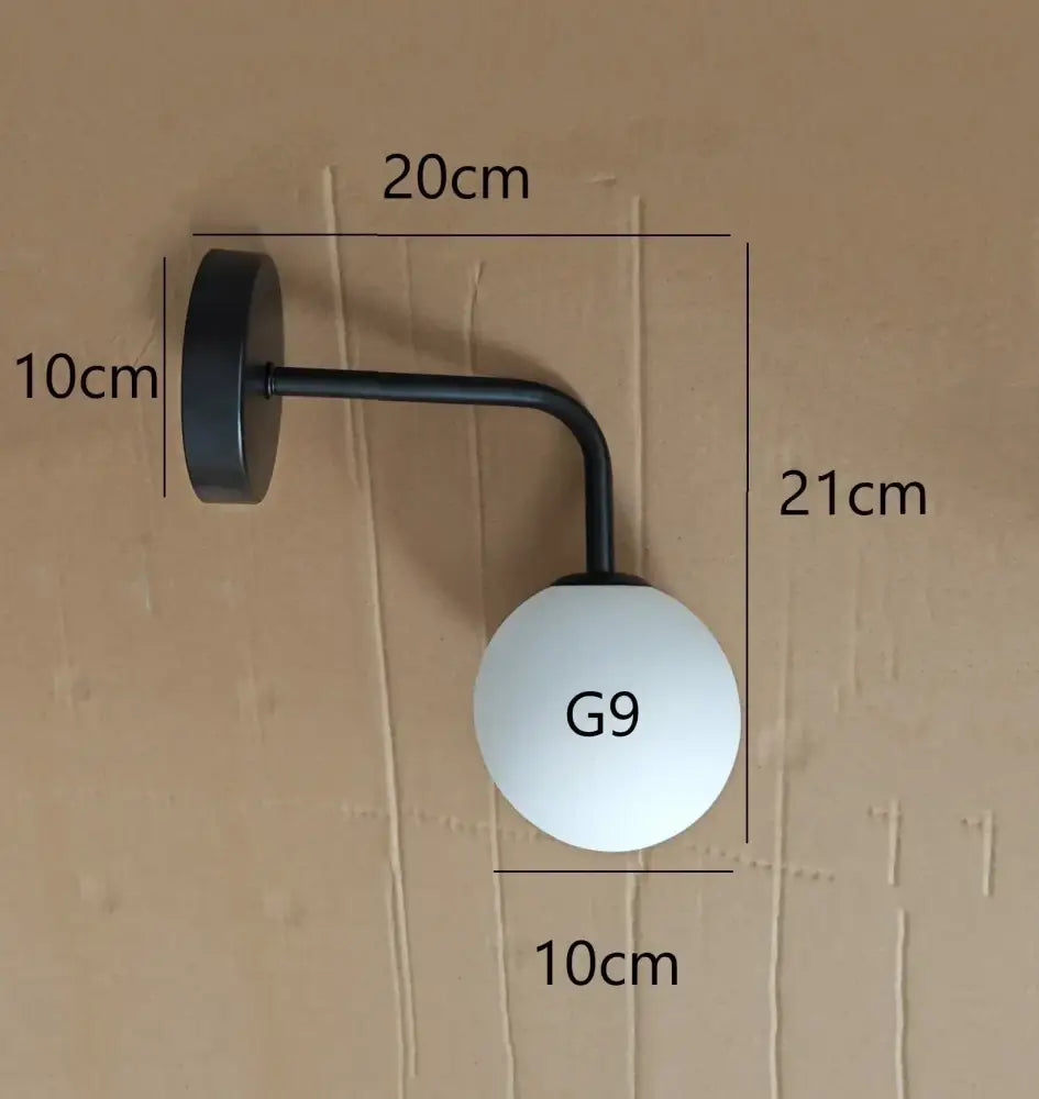 Elegant gold glass wall lamp for living room with frosted globe shade