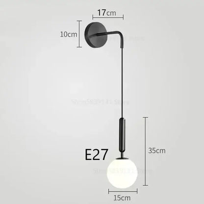 Elegant gold glass wall lamp for living room with frosted globe shade