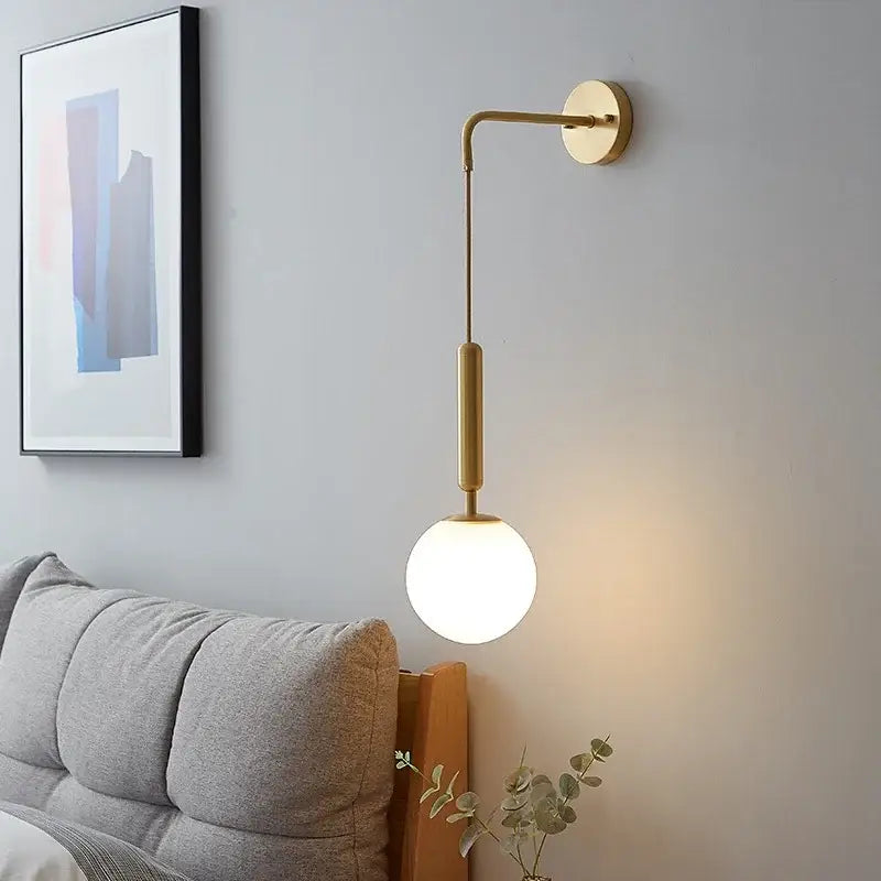 Elegant gold glass wall lamp for living room with frosted globe shade
