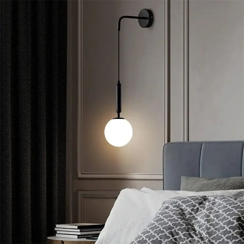 Elegant gold glass wall lamp for living room with frosted globe shade