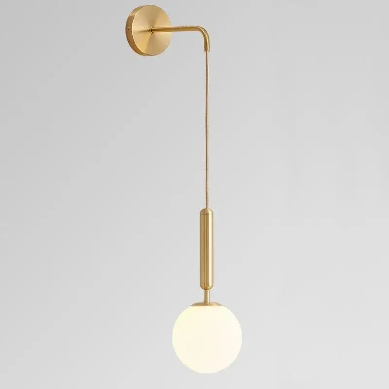 Elegant gold glass wall lamp for living room with frosted globe shade