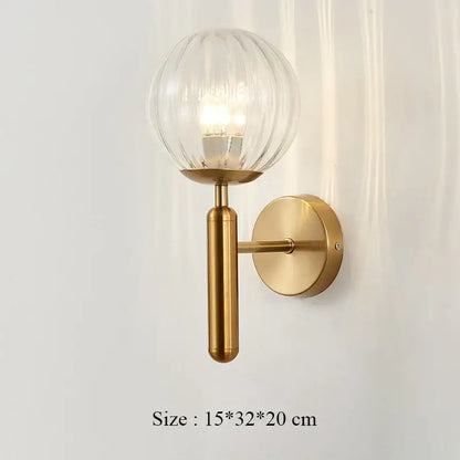 Elegant gold iron wall lamp with frosted glass shade for bedroom