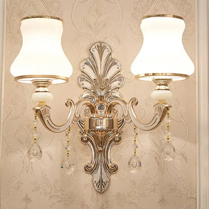 Elegant gold scrolled arm wall mount sconce bedroom crystal light