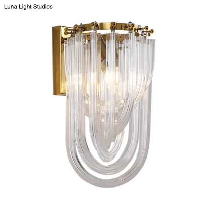 Elegant gold wall lamp with twisted crystal shade for bedroom