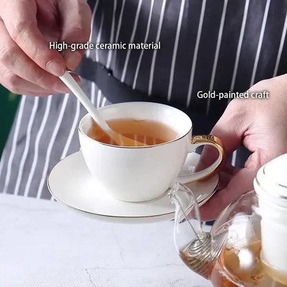 Elegant gold & white ceramic tea set with glass teapot kitchen warmer