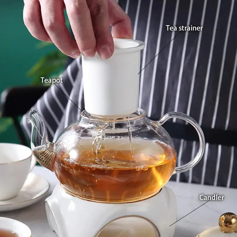 Elegant gold & white ceramic tea set with glass teapot kitchen warmer