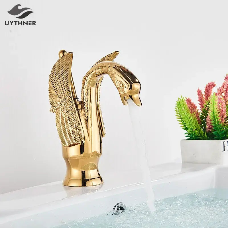 Elegant golden swan faucet bathroom hot and cold mixer tap
